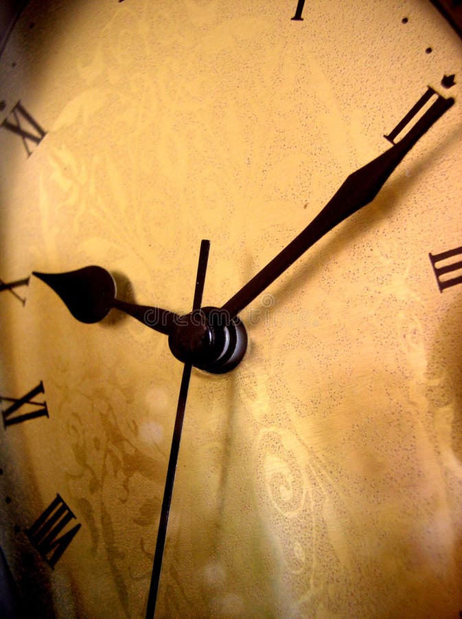 Time on an antique clock - warm hued. Time on an antique clock - warm hued