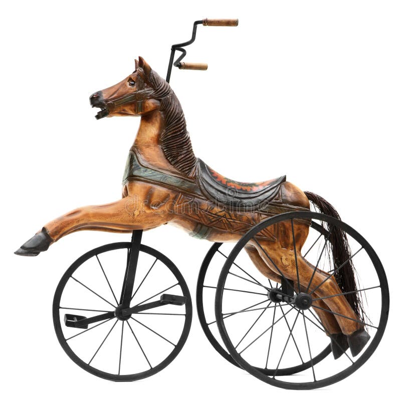 Antikes hölzernes Pferdedreiradfahrrad lizenzfreies stockfoto Antikes hölzernes Pferdedreiradfahrrad lizenzfreies stockfoto