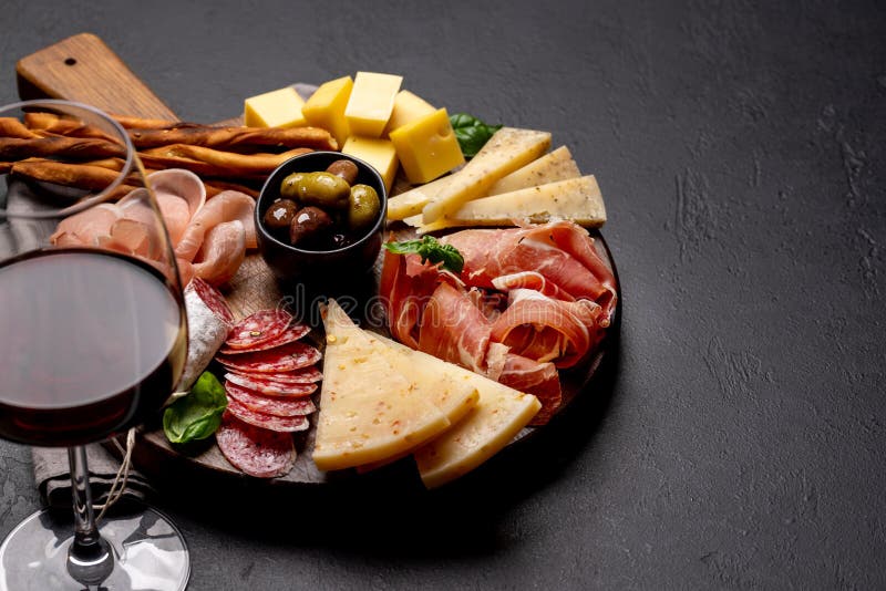 Antipasto Board with Various Meat and Cheese Snacks Stock Photo Image