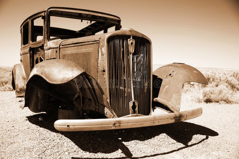 Antique american car in the desert royalty free stock image