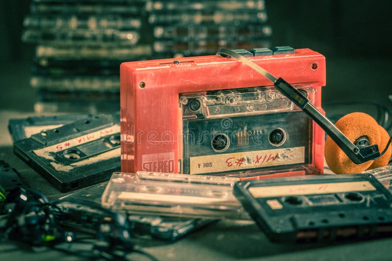 Antique audio cassette with walkman and headphones stock images Antique audio cassette with walkman and headphones stock images