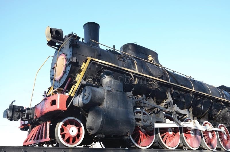 Antique Black Retro-train On Track. A Monument To The Industrial Achievements Of The Soviet Unio