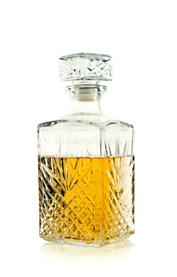 Antique bottle of whiskey / Scotch on white royalty free stock images