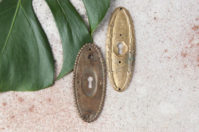 Antique brass keyhole lock covers stock photos