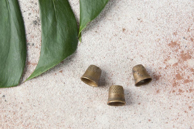 Antique brass thimbles stock photo. Image of text, classic 164678664