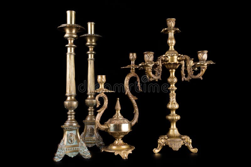 Antique Bronze Chandeliers on a Black Background, Several Types of Old