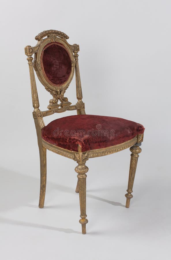 Antique chair with velvet decoration, on white background stock photos Antique chair with velvet decoration, on white background stock photos