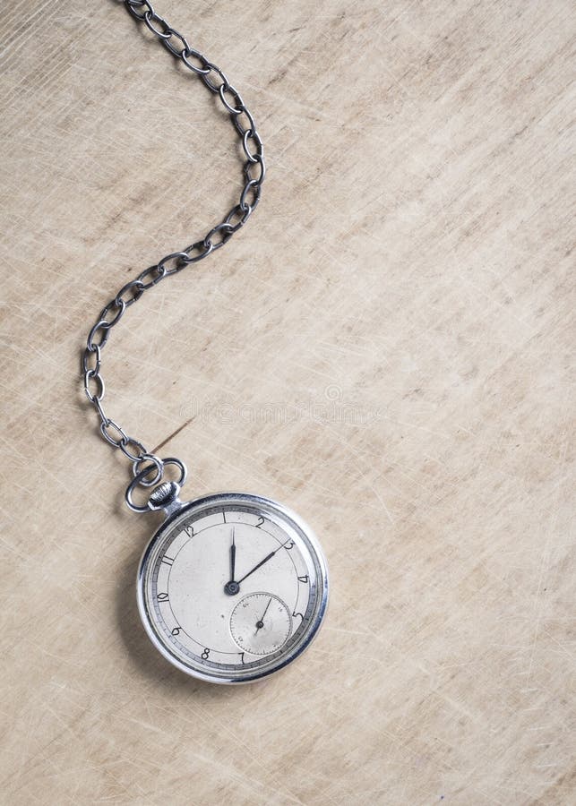 Old Clock With Chain Lying On Rough Green Surface Stock Image Image