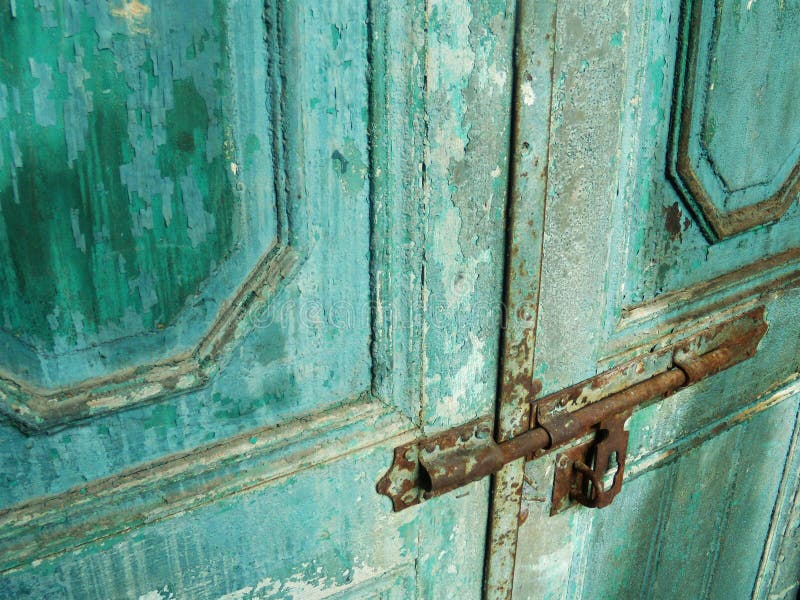 Antique Door with Chipped Blue Paint and Rusted Lock Stock Image