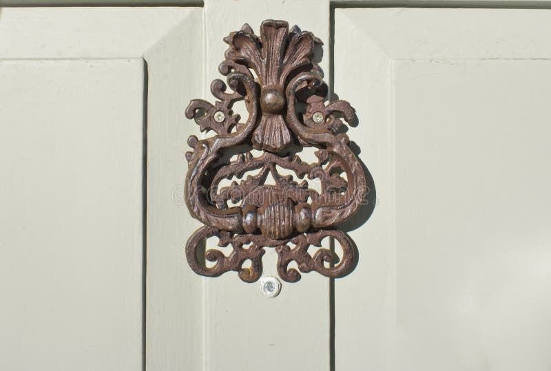 Antique door knocker stock image