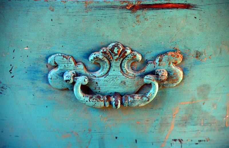 Antique Drawer Pull in Turquoise stock photo