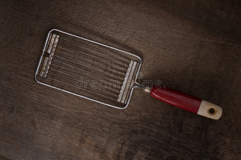 Antique Egg Slicer on a Wooden Surface Stock Image Image of cutting