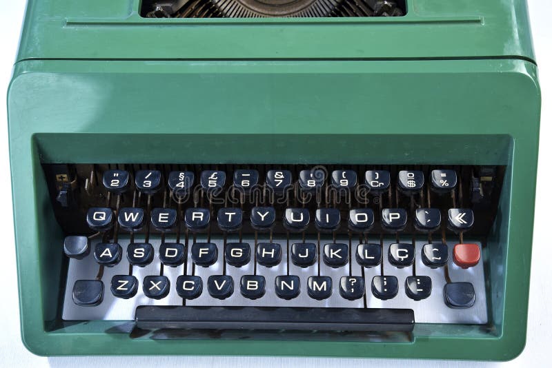 Green Typewriter with the Cyrillic Alphabet Isolated on a White