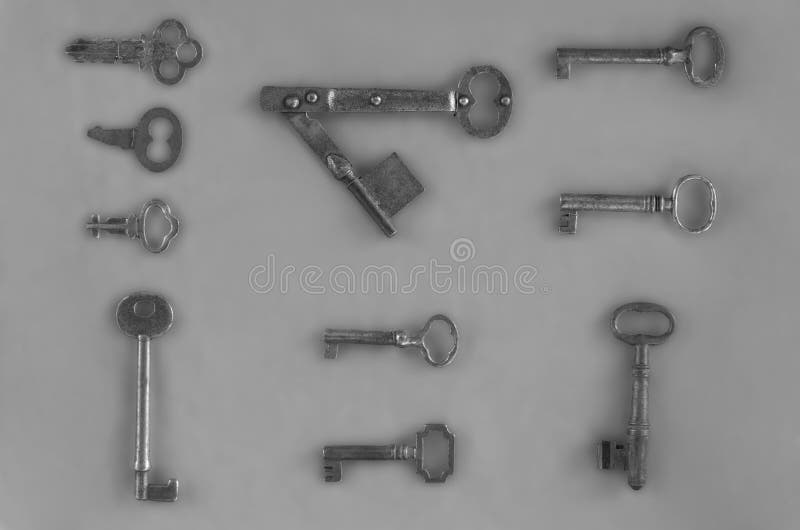 Antique Keys Against Gray stock images Antique Keys Against Gray stock images