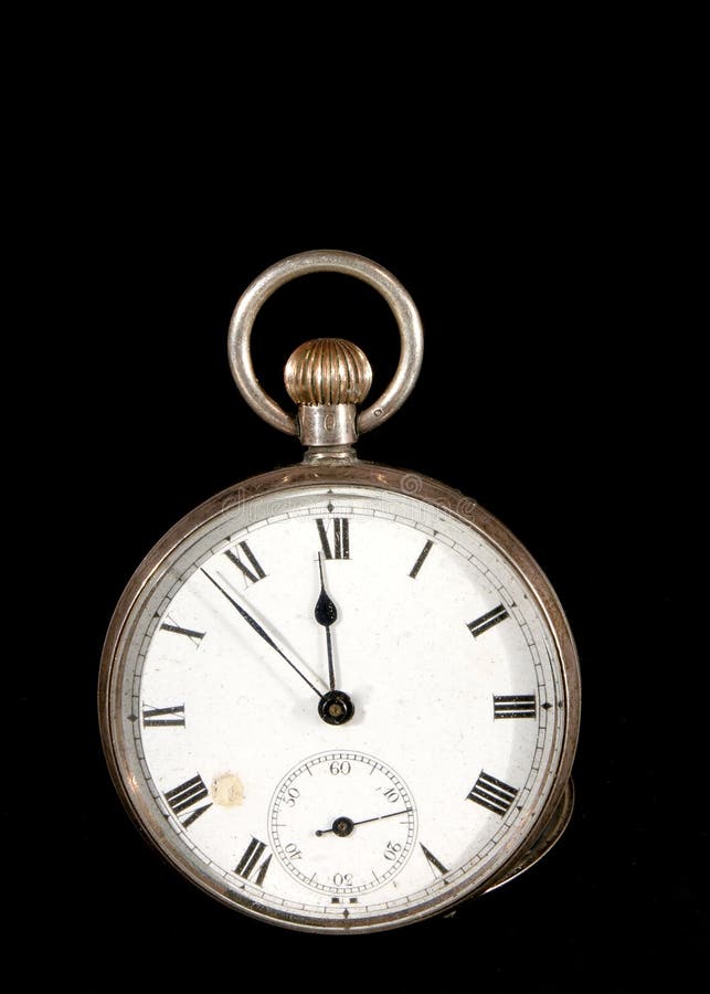 Antique pocket watch on black