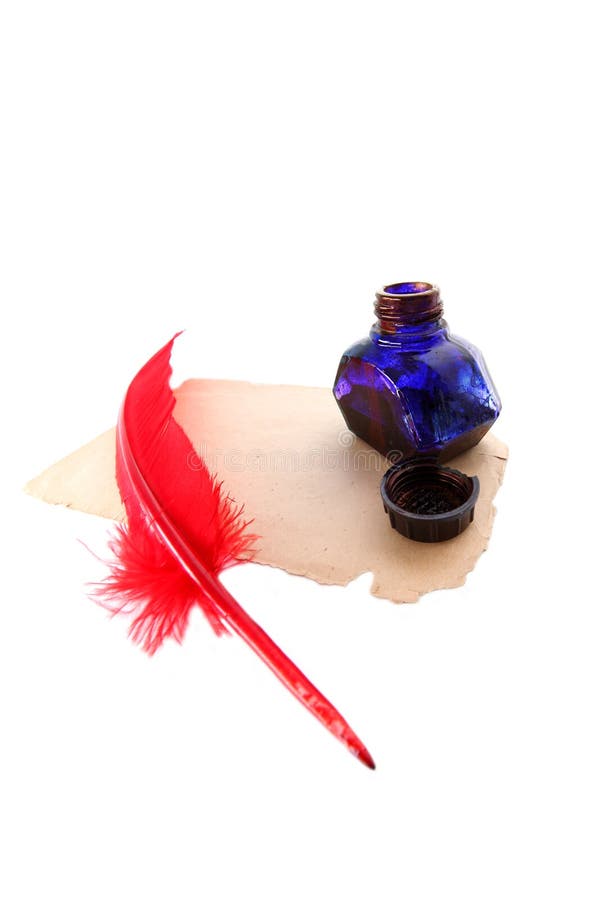 Antique red pen and inkwell royalty free stock images