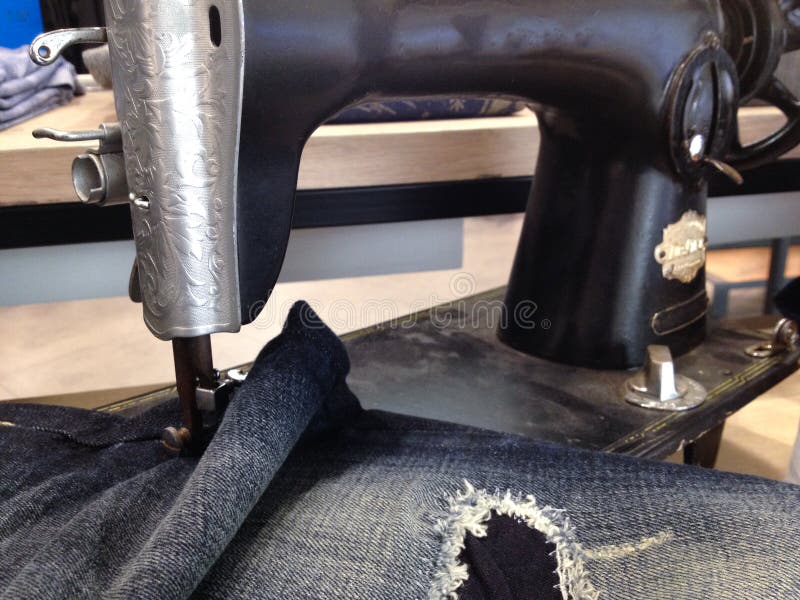 Antique Sewing Machine and Blue Jeans Stock Photo Image of industry