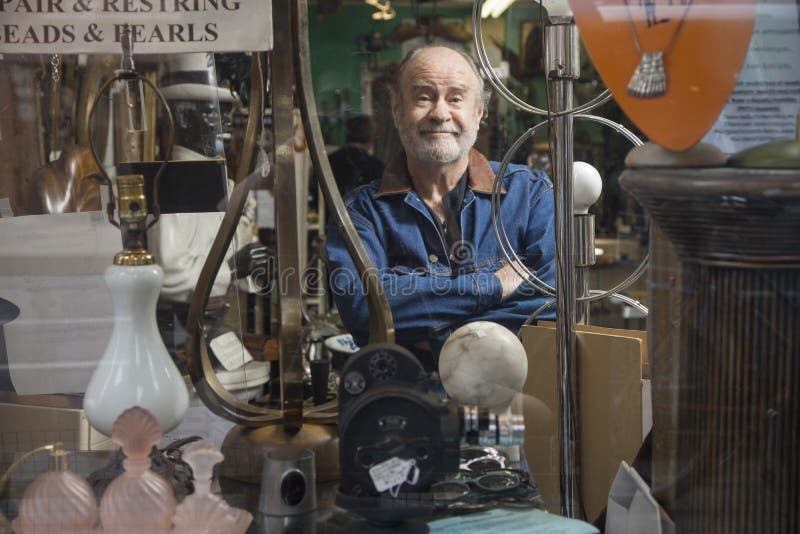Antique store owner royalty free stock photo Antique store owner royalty free stock photo