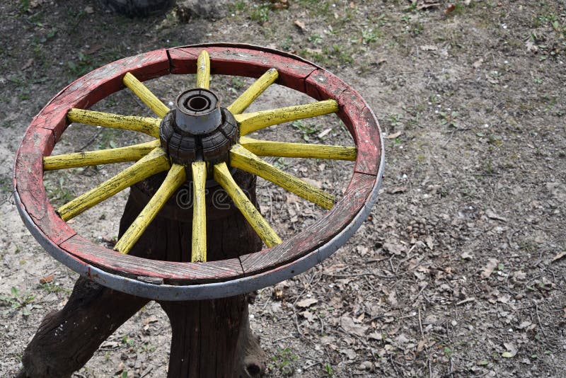 Antique wooden wheel table stock photo. Image of heritage 179564750