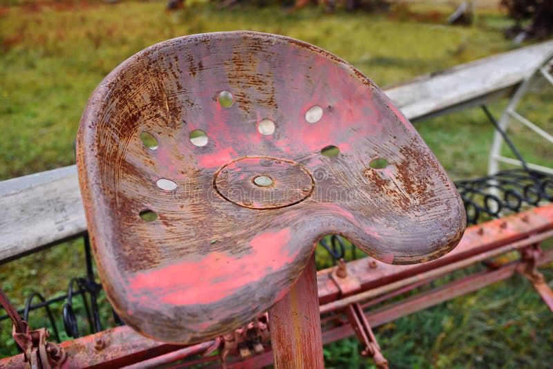 Antique Tractor Seat stock photo. Image of used, machine 126582660