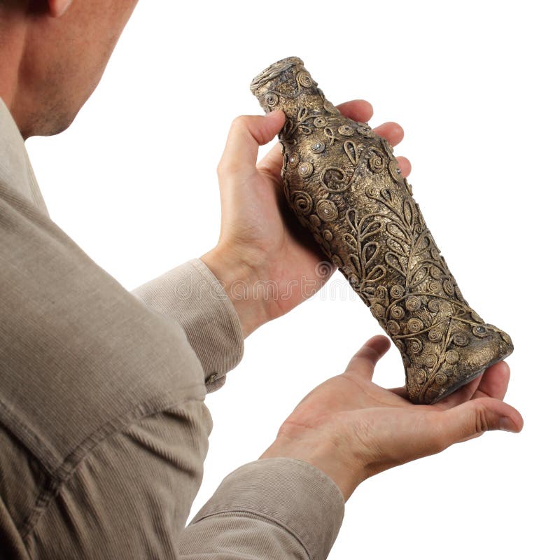 Antique vase in the hands royalty free stock photography Antique vase in the hands royalty free stock photography