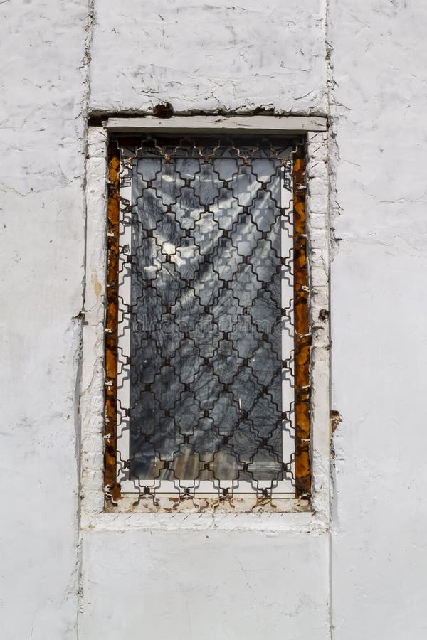 Antique window with bars stock image. Image of brick 198263009