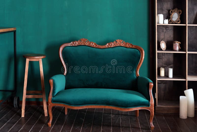 Antique wood sofa couch in vintage room. Classical style armchair.