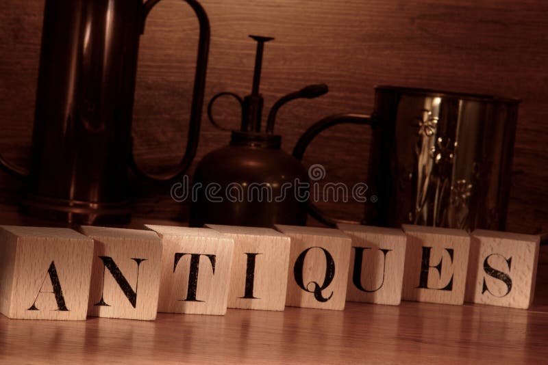 Antiques Word Spelled with Old Letter Blocks