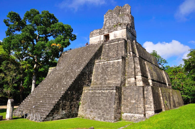 Ancient Maya temple in Tikal, the archaeological site and urban center of the pre-Columbian Maya civilization, Guatemala. Ancient Maya temple in Tikal, the archaeological site and urban center of the pre-Columbian Maya civilization, Guatemala