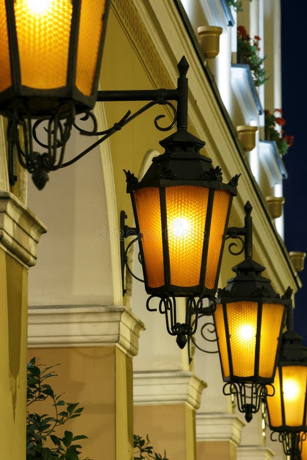 Antique street lights row,warsaw night. Antique street lights row,warsaw night