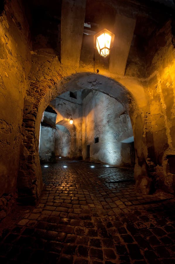 Antique medieval passage in Sighisoara by night. Antique medieval passage in Sighisoara by night