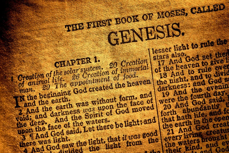 Old antique Holy Bible Christian religion book open to the first page of Moses original chapter of genesis and text about god creation of heaven and hearth in the religious Ancient Testament. Old antique Holy Bible Christian religion book open to the first page of Moses original chapter of genesis and text about god creation of heaven and hearth in the religious Ancient Testament