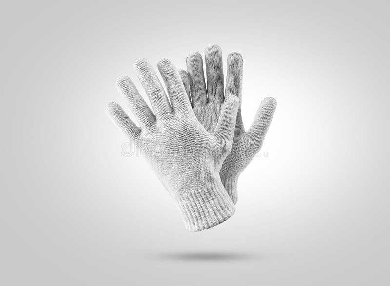Blank knitted winter gloves mockup. Clear ski or snowboard mittens mock up, isolated. Warm hand clothes design template. Plain arm accessory presentation for branding. Blank knitted winter gloves mockup. Clear ski or snowboard mittens mock up, isolated. Warm hand clothes design template. Plain arm accessory presentation for branding.