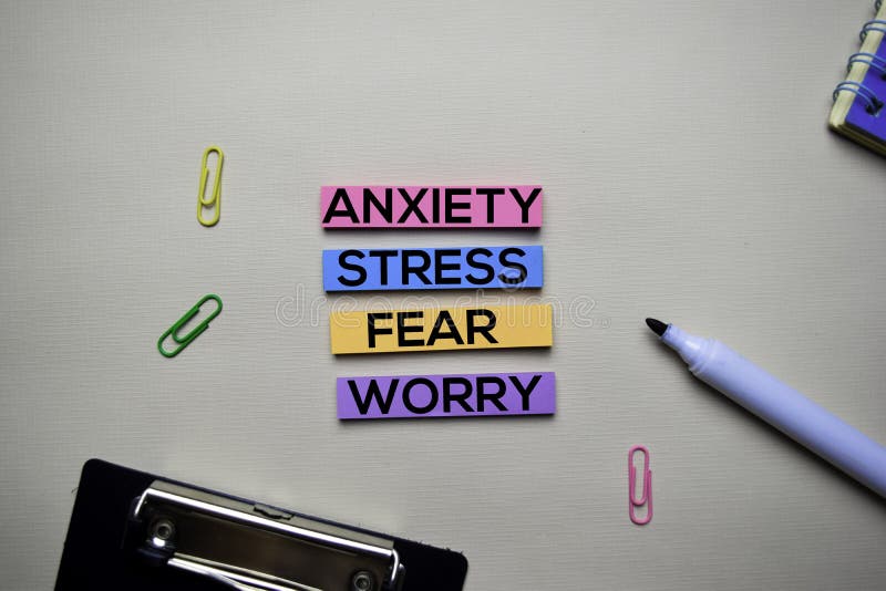 Anxiety - Stress - Fear - Worry text on sticky notes with office desk concept royalty free stock photography