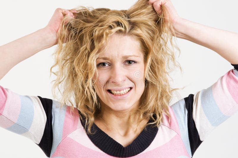 Anxious hair pulling woman στοκ εικόνα