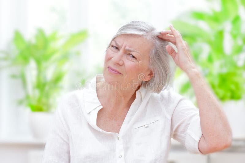 Senior woman thinning hair loss