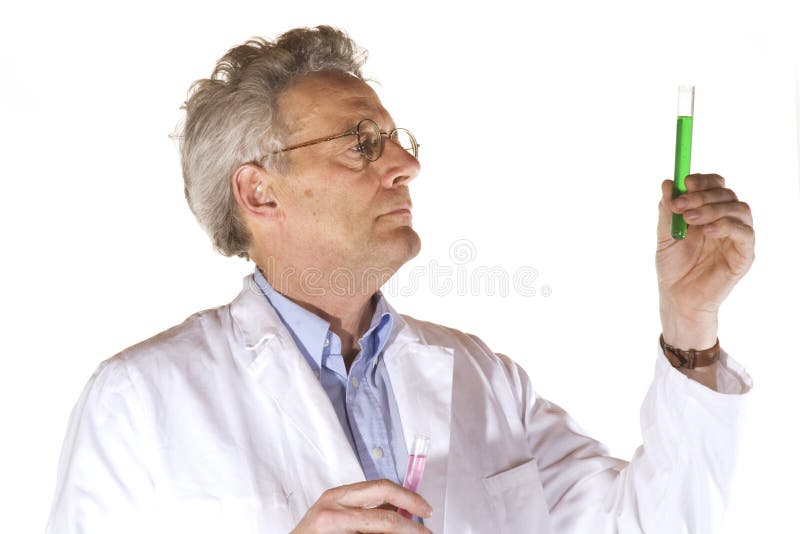 Man is analyzing liquids in the laboratory. Man is analyzing liquids in the laboratory