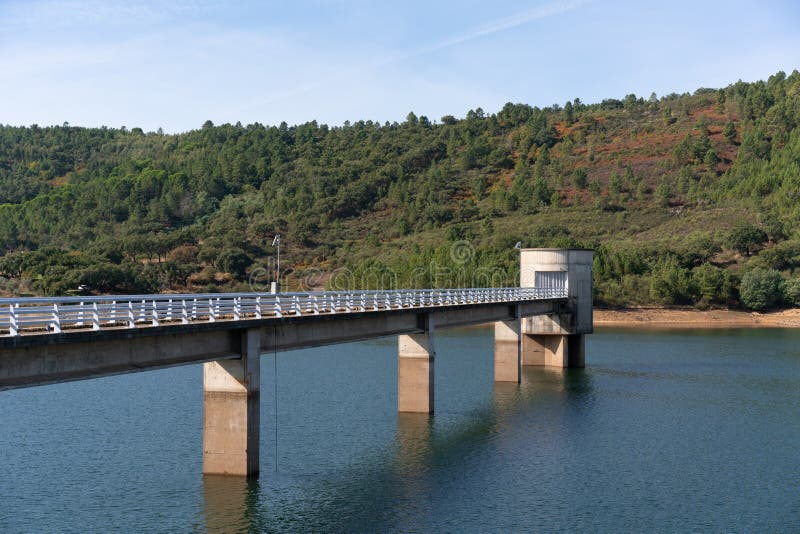 Apartadura dam nature landscape with reflection on the still water in Sao Mamede, Alentejo, Portugal