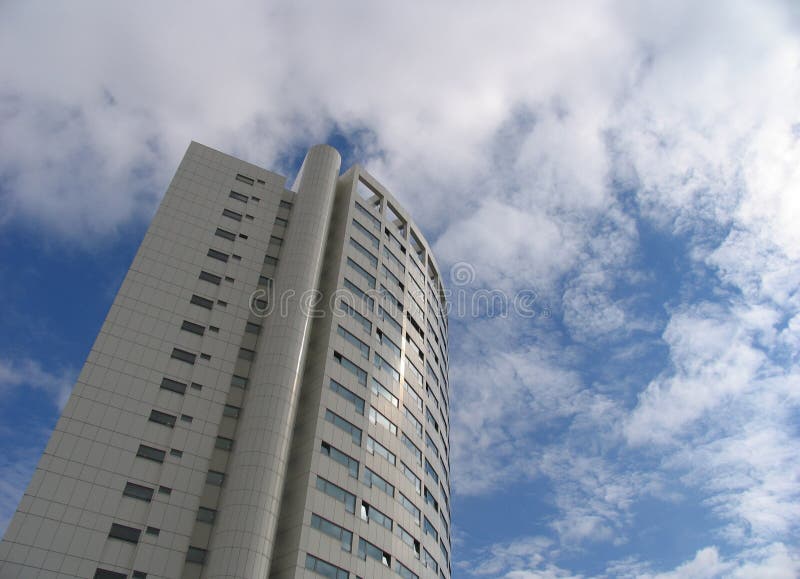 Apartment building in Austria. White apartment building in Vienna, Austria. nice blue sky with white clouds stock photo Apartment building in Austria. White apartment building in Vienna, Austria. nice blue sky with white clouds stock photo