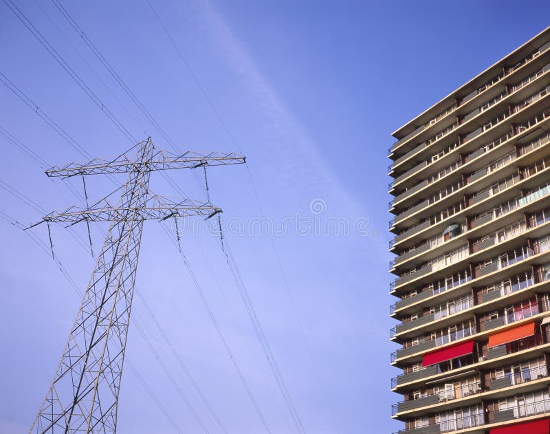 Apartment Building Next To an Electricity Pole Stock Photo Image of