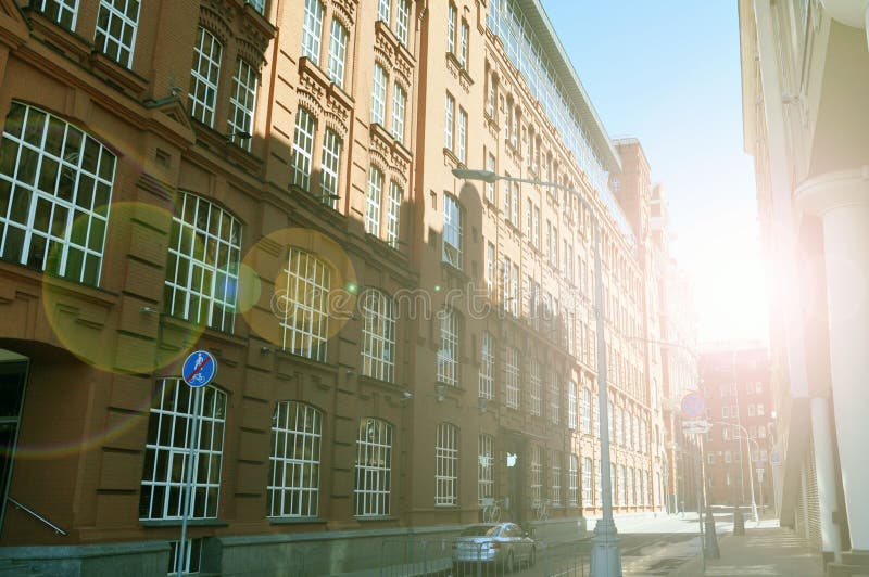 Apartment building on the street flooded with sunlight, Moscow, Russia stock photography Apartment building on the street flooded with sunlight, Moscow, Russia stock photography