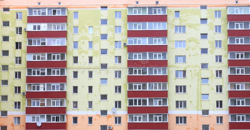 Apartment house, new beautiful house with red balconies