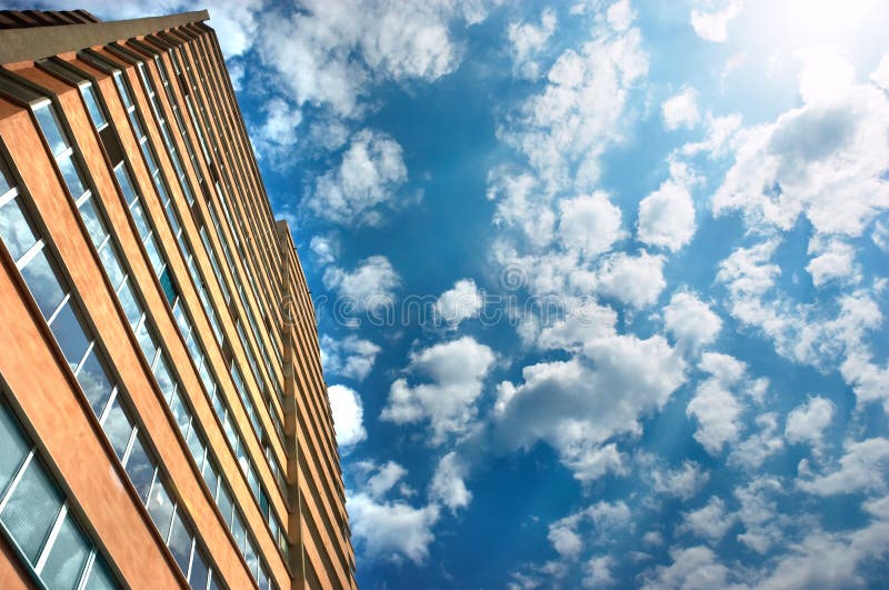 Apartments building and cloudy stock image