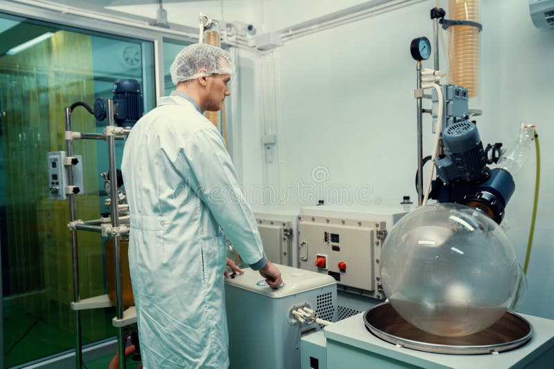 Apothecary extract using cannabis extraction machine in laboratory.