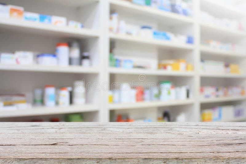 Apothekenprodukt-Anzeigenzähler mit Drugstoreregalen stockbilder Apothekenprodukt-Anzeigenzähler mit Drugstoreregalen stockbilder