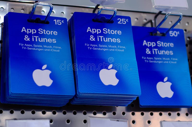 View on Apple Itunes and App Store Gift Voucher Card Hold by Hand