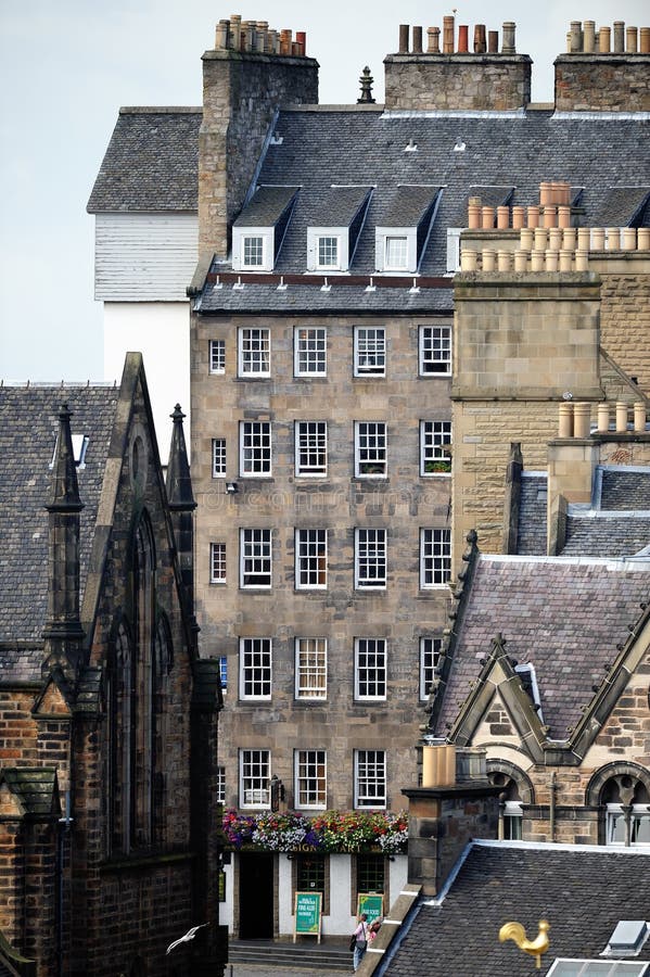 Milne's Court on the Lawnmarket, top of the Royal Mile, Old Town, Edinburgh, with characteristic sash and case windows. There has been a pub on this site from the 17th Century. The current one is named after the Ensign Charles Ewart who fought at Waterloo. Milne's Court on the Lawnmarket, top of the Royal Mile, Old Town, Edinburgh, with characteristic sash and case windows. There has been a pub on this site from the 17th Century. The current one is named after the Ensign Charles Ewart who fought at Waterloo.