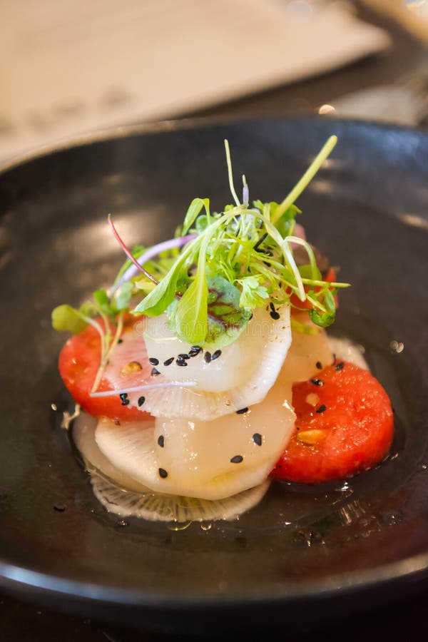 Pickled scallop and radish with sweet watermelon stock image Pickled scallop and radish with sweet watermelon stock image
