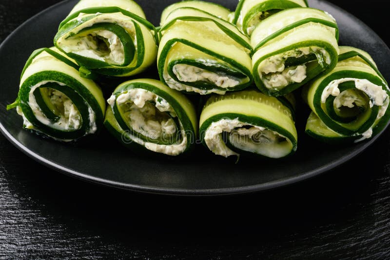 Appetizer Cucumber Rolls Stuffed with Cream Cheese, Garlic and