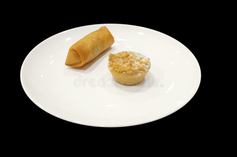Appetizer sampler with spring roll and tart on white dish royalty free stock photo Appetizer sampler with spring roll and tart on white dish royalty free stock photo